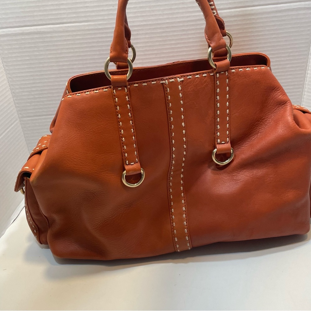 Antonio Milani Carry/Hobo Leather Handbag cognac color. Comes with strap.
